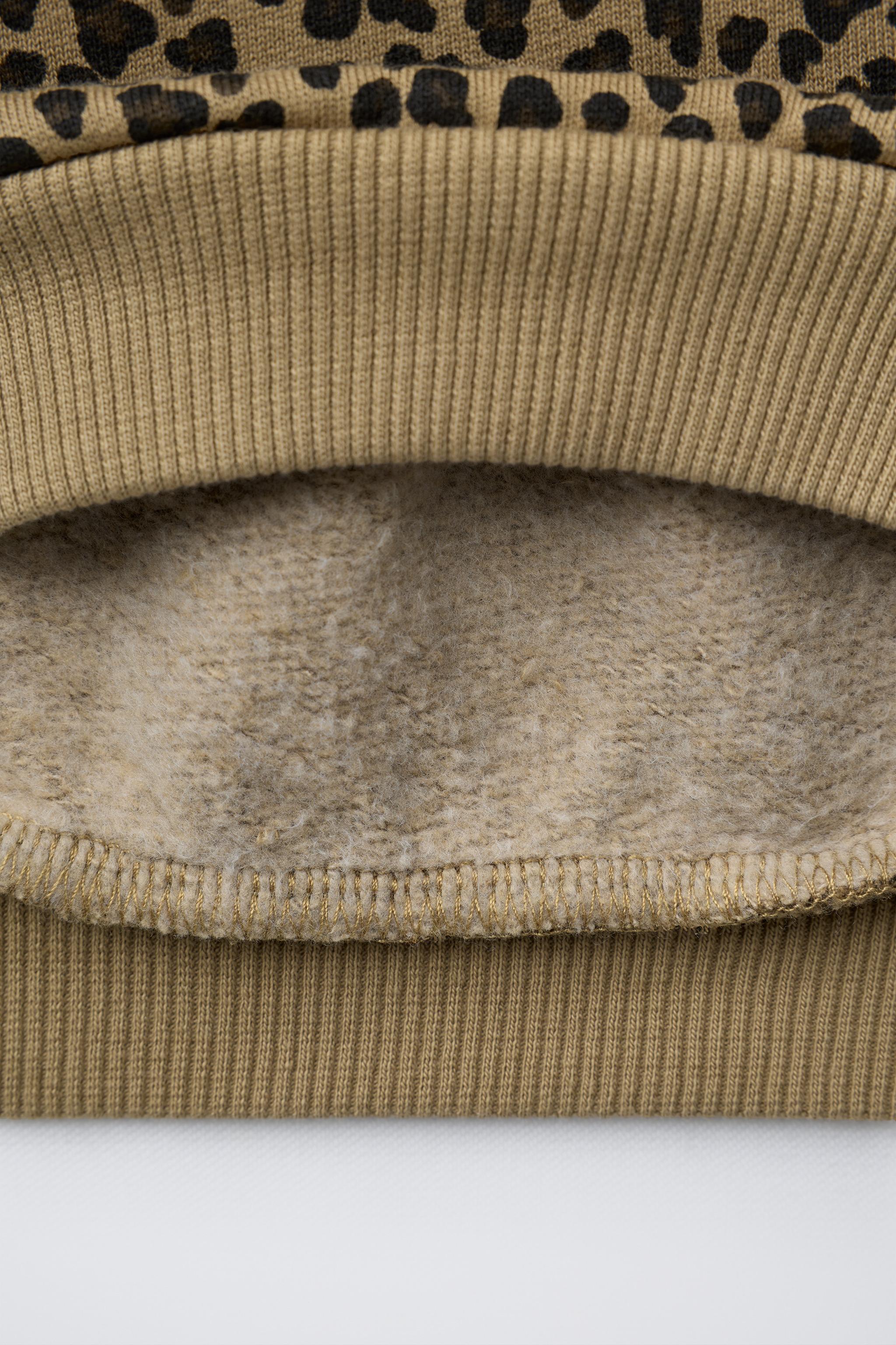 HEAVYWEIGHT ANIMAL PRINT SWEATSHIRT